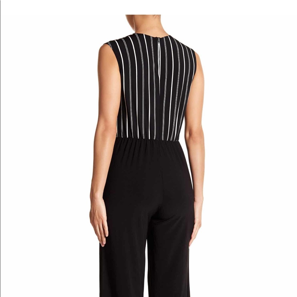 New jumpsuit bebe size us6